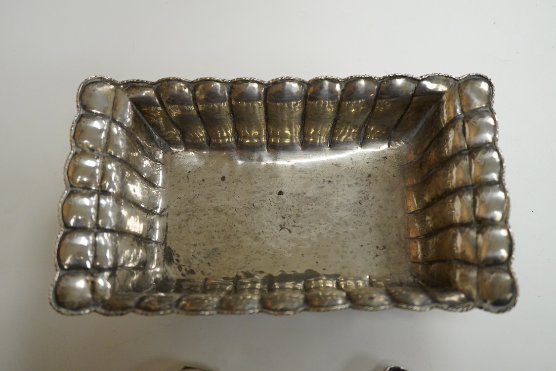 A continental 800 standard oblong shaped dish, of fluted design, together with a Peruvian sterling dish and similar pill box and a George V silver cigarette case, 16.6oz.